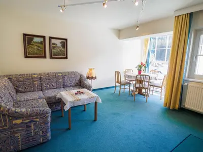 Ein Sitzbereich in der Unterkunft Aparthotel Alpina