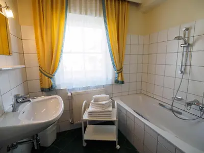 Ein Badezimmer in der Unterkunft Aparthotel Alpina