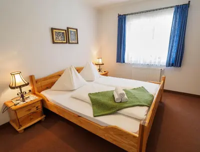 Ein Bett oder Betten in einem Zimmer der Unterkunft Haus Winkler