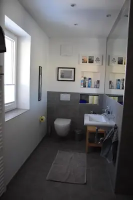 Ein Badezimmer in der Unterkunft feels like home