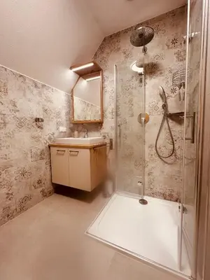 Ein Badezimmer in der Unterkunft Almtalhotel Appartements in Pettenbach