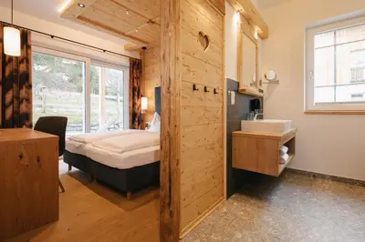 Ein Bett oder Betten in einem Zimmer der Unterkunft Chalet Village by Apart4you