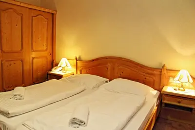 Ein Bett oder Betten in einem Zimmer der Unterkunft Hotel Post