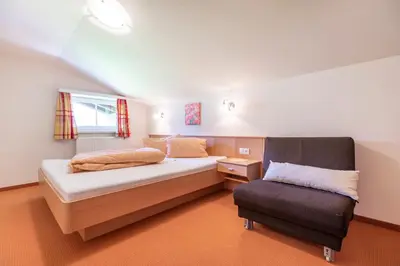 Ein Bett oder Betten in einem Zimmer der Unterkunft Wechslerhof