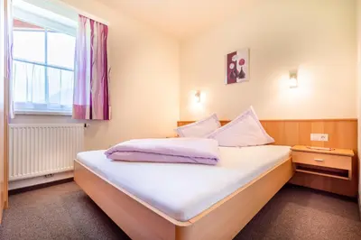 Ein Bett oder Betten in einem Zimmer der Unterkunft Wechslerhof
