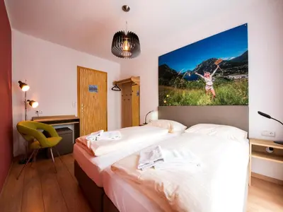Ein Bett oder Betten in einem Zimmer der Unterkunft Schlafmeile Traunsee