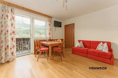 Ein Sitzbereich in der Unterkunft Stögergut by Schladming-Appartements