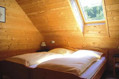 Ein Bett oder Betten in einem Zimmer der Unterkunft Chalet in Schlierbach near Ski Trails