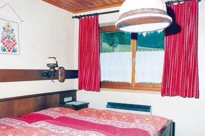 Ein Bett oder Betten in einem Zimmer der Unterkunft Apartments home Hermann, Ramsau am Dachstein