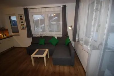 Ein Sitzbereich in der Unterkunft Haus Intaba