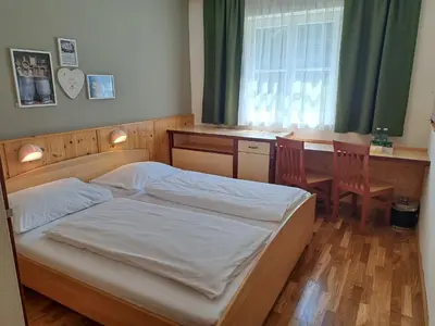 Ein Bett oder Betten in einem Zimmer der Unterkunft JUFA Hotel Bad Aussee
