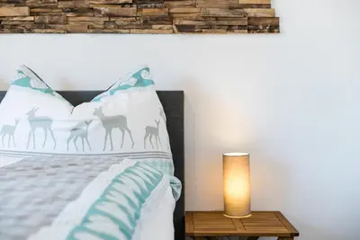 Ein Bett oder Betten in einem Zimmer der Unterkunft Pistenblick