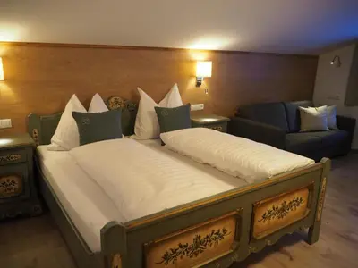 Ein Bett oder Betten in einem Zimmer der Unterkunft Haus Florian Appartements