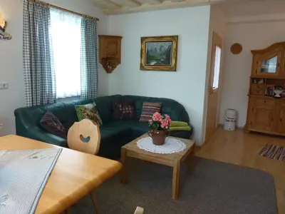 Ein Sitzbereich in der Unterkunft Haus Rigl