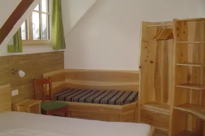 Ein Bett oder Betten in einem Zimmer der Unterkunft Ferienhof Rinnergut