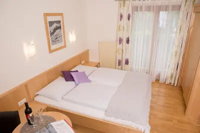 Ein Bett oder Betten in einem Zimmer der Unterkunft Landhaus Huber