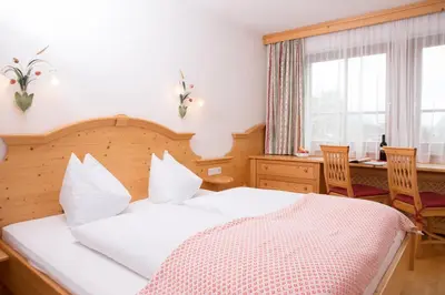 Ein Bett oder Betten in einem Zimmer der Unterkunft Landhaus Huber