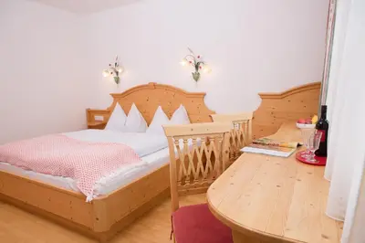 Ein Bett oder Betten in einem Zimmer der Unterkunft Landhaus Huber