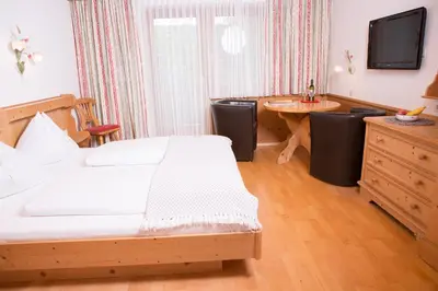 Ein Bett oder Betten in einem Zimmer der Unterkunft Landhaus Huber