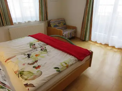 Ein Bett oder Betten in einem Zimmer der Unterkunft Haus Buchsteiner