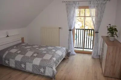 Ein Bett oder Betten in einem Zimmer der Unterkunft Ferienhaus Saxenauer
