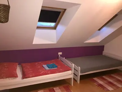 Ein Bett oder Betten in einem Zimmer der Unterkunft Ferienwohnung Sagmeister Wirtgut St. Andrä