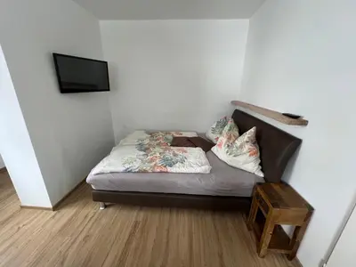 Ein Bett oder Betten in einem Zimmer der Unterkunft Haus Alpina Ski In & Ski Out