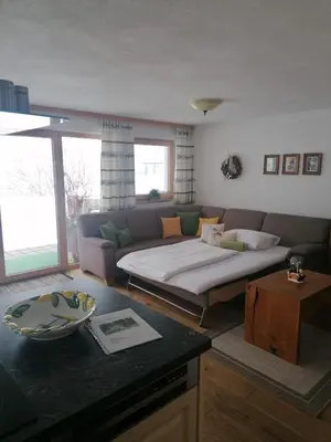 Ein Sitzbereich in der Unterkunft Chalet Bergheimat