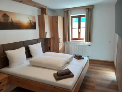 Ein Bett oder Betten in einem Zimmer der Unterkunft Gasthof Steinbichler