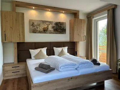 Ein Bett oder Betten in einem Zimmer der Unterkunft Gasthof Steinbichler