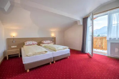 Ein Bett oder Betten in einem Zimmer der Unterkunft Aparthotel Pichler