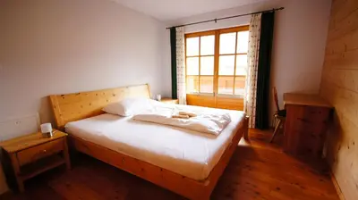 Ein Bett oder Betten in einem Zimmer der Unterkunft Chalet Lisa