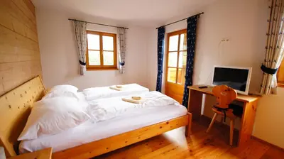 Ein Bett oder Betten in einem Zimmer der Unterkunft Chalet Lisa