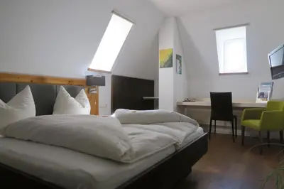 Ein Bett oder Betten in einem Zimmer der Unterkunft Villa Sonnwend National Park Lodge