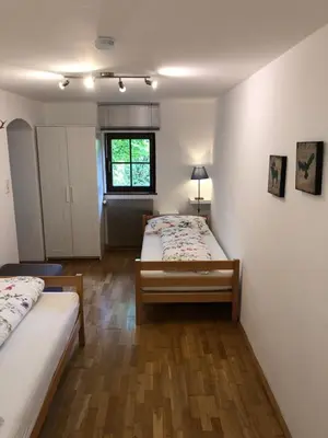 Ein Bett oder Betten in einem Zimmer der Unterkunft Ferienwohnung Woferlbauer