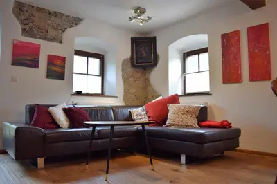 Ein Sitzbereich in der Unterkunft Ferienwohnung Woferlbauer