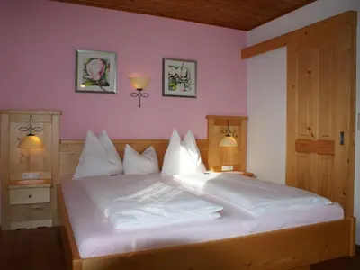 Ein Bett oder Betten in einem Zimmer der Unterkunft Biobauernhof Nussbaumer