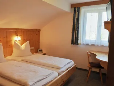 Ein Bett oder Betten in einem Zimmer der Unterkunft Schieplechnerhof