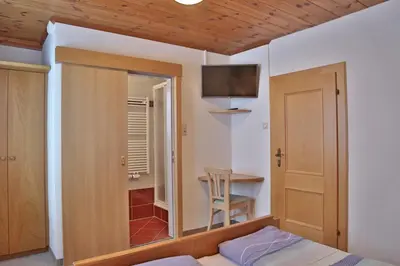 Ein Bett oder Betten in einem Zimmer der Unterkunft Oberauhof