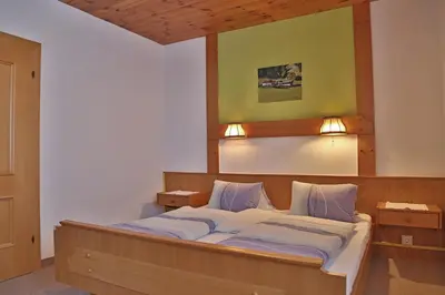 Ein Bett oder Betten in einem Zimmer der Unterkunft Oberauhof