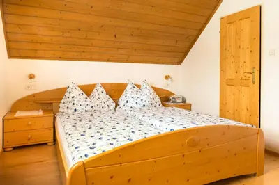 Ein Bett oder Betten in einem Zimmer der Unterkunft Bio Bauernhof Schoberhof
