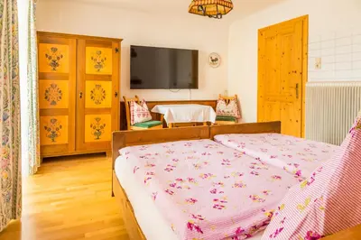 Ein Bett oder Betten in einem Zimmer der Unterkunft Bio Bauernhof Schoberhof