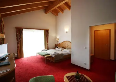 Ein Bett oder Betten in einem Zimmer der Unterkunft Aktiv- und Wellnesshotel Gutjahr