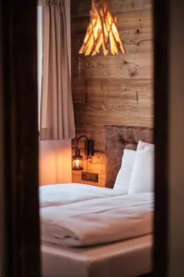 Ein Bett oder Betten in einem Zimmer der Unterkunft Almdorf Omlach, Fanningberg