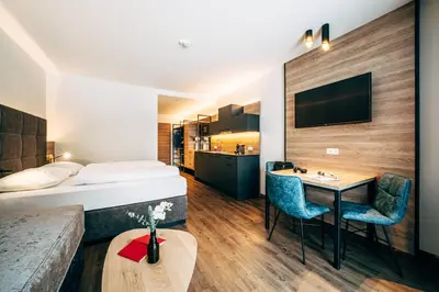 Ein Bett oder Betten in einem Zimmer der Unterkunft FOXY Obertauern