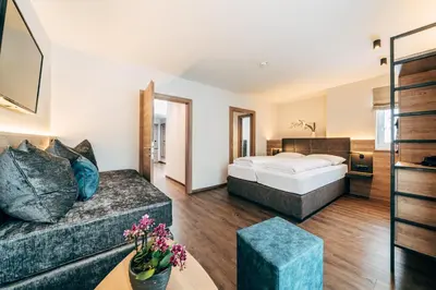 Ein Bett oder Betten in einem Zimmer der Unterkunft FOXY Obertauern