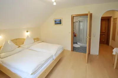 Ein Bett oder Betten in einem Zimmer der Unterkunft Feichtlehnerhof