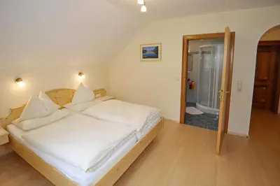 Ein Bett oder Betten in einem Zimmer der Unterkunft Feichtlehnerhof