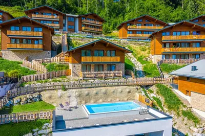 Der Swimmingpool an oder in der Nähe von Chalet Dorf Wagrain Alpenleben by AlpenTravel