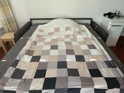Ein Bett oder Betten in einem Zimmer der Unterkunft Ferienwohnung Kronegarten